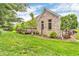 Home's exterior reveals a wooden deck accessible from the side yard of the home at 720 Willow Pointe North Dr, Plainfield, IN 46168