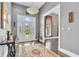 Charming foyer with beautiful flooring and ample natural light at 720 Willow Pointe North Dr, Plainfield, IN 46168
