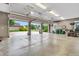 Three-car garage offering ample space, overhead lighting and an open door to the driveway at 720 Willow Pointe North Dr, Plainfield, IN 46168