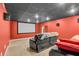 Basement home theater with a large screen, surround sound speakers, and comfortable seating at 720 Willow Pointe North Dr, Plainfield, IN 46168