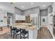 Modern kitchen with a granite island, stainless steel appliances, and white cabinets at 720 Willow Pointe North Dr, Plainfield, IN 46168