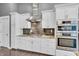Modern kitchen featuring stainless steel appliances, granite countertops, and brick backsplash at 720 Willow Pointe North Dr, Plainfield, IN 46168