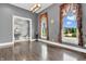 Spacious living room with hardwood floors, natural light, and elegant decor at 720 Willow Pointe North Dr, Plainfield, IN 46168