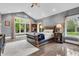 Bedroom featuring a vaulted ceiling, plush bedding, and large windows at 720 Willow Pointe North Dr, Plainfield, IN 46168