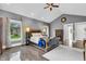 Primary bedroom with a vaulted ceiling, ceiling fan, and neutral decor at 720 Willow Pointe North Dr, Plainfield, IN 46168