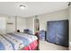A serene bedroom with a queen bed, ample closet space, and calming colors, perfect for relaxation at 7238 Moultrie Dr, Indianapolis, IN 46217