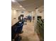 Finished basement area with a fully equipped workout area and a stylish bar offering ample space for entertaining and fitness at 7255 Haverhill Ct, Indianapolis, IN 46250