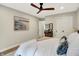 Bright bedroom with hardwood floors, ceiling fan, and double door closet at 7255 Haverhill Ct, Indianapolis, IN 46250