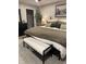 Well-appointed bedroom showcasing a comfortable bed, stylish decor, and ample storage in a serene setting at 7255 Haverhill Ct, Indianapolis, IN 46250