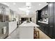 Bright kitchen features white countertops, stainless steel appliances, and a center island at 7255 Haverhill Ct, Indianapolis, IN 46250