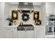 Charming kitchen boasts stainless appliances, a gas range, and a decorative wreath at 7255 Haverhill Ct, Indianapolis, IN 46250