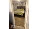 Bedroom features a comfortable bed with soft lighting and decor at 7504 N Green Meadows, Fairland, IN 46126