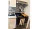 Well-equipped kitchen features modern appliances and a stylish backsplash at 7504 N Green Meadows, Fairland, IN 46126