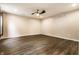 Neutral bedroom with ceiling fan, recessed lights and wood floors at 7536 Mccord St, McCordsville, IN 46055