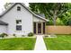 Inviting home with a screen porch, walkway, tidy landscaping, and freshly cut lawn at 7536 Mccord St, McCordsville, IN 46055
