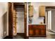 Charming kitchen featuring custom cabinetry, shelving, and granite countertops at 7536 Mccord St, McCordsville, IN 46055