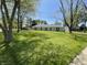 Ranch style home with a well-manicured front yard and mature trees offers great curb appeal at 7731 Scarborough S Blvd, Indianapolis, IN 46256