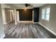 Bright and open living room boasts sleek floors, modern colors, and a welcoming entrance at 7731 Scarborough S Blvd, Indianapolis, IN 46256