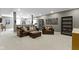 Finished basement with plush carpet, comfortable seating, and stylish decor at 7744 Preservation Dr, Indianapolis, IN 46278