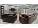 Finished basement featuring comfortable seating, entertainment area, and modern décor at 7744 Preservation Dr, Indianapolis, IN 46278