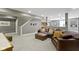 Finished basement area offering comfortable seating and stylish design features at 7744 Preservation Dr, Indianapolis, IN 46278