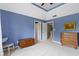 Serene bedroom with carpet floors, neutral paint, and convenient access to additional spaces at 7744 Preservation Dr, Indianapolis, IN 46278