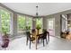 Charming dining nook with large windows offering scenic views at 7744 Preservation Dr, Indianapolis, IN 46278