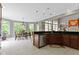 Kitchen featuring stainless steel appliances, views into the dining nook, and ample natural light at 7744 Preservation Dr, Indianapolis, IN 46278