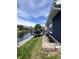 Beautiful backyard featuring a deck with outdoor seating and water access at 7838 Chesapeake E Dr, Indianapolis, IN 46236