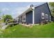 Beautiful backyard with a well-maintained lawn and views of the deck at 7838 Chesapeake E Dr, Indianapolis, IN 46236