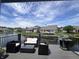Enjoy the scenery from this porch equipped with outdoor furniture and a grill at 7838 Chesapeake E Dr, Indianapolis, IN 46236
