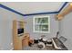 Bedroom showcasing musical instruments, including a keyboard and drum set, ideal for a creative space at 7915 Broadview Dr, Indianapolis, IN 46227