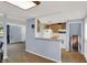 The kitchen offers ample counter space, appliances and lots of natural light at 7915 Broadview Dr, Indianapolis, IN 46227