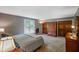 Bedroom with neutral walls, plush carpeting, and dual closets at 8000 Mcwhorter Rd, Martinsville, IN 46151