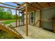 A custom-built enclosed catio with access to the house and a built-in wooden ladder at 8000 Mcwhorter Rd, Martinsville, IN 46151