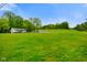 Long driveway leading to a spacious lawn and outbuilding at 8000 Mcwhorter Rd, Martinsville, IN 46151