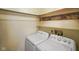 Functional laundry room with a washing machine and dryer with front-loading access at 8000 Mcwhorter Rd, Martinsville, IN 46151