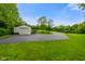 Large outbuilding with a garage door and covered parking at 8000 Mcwhorter Rd, Martinsville, IN 46151