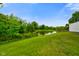 Scenic pond surrounded by lush greenery at 8000 Mcwhorter Rd, Martinsville, IN 46151