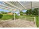 Spacious backyard deck, perfect for outdoor relaxation and entertainment in a serene setting at 8465 Hilltop Ln, Martinsville, IN 46151