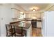 Functional kitchen with ample counter space, white cabinetry, and black appliances at 8465 Hilltop Ln, Martinsville, IN 46151