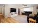 Well-lit living room with hardwood floors and stylish decor at 9104 W Lone Beech Dr, Muncie, IN 47304