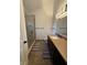 Bathroom featuring a walk-in shower, granite countertops, and decorative lighting at 9535 Longwell Dr, Indianapolis, IN 46240