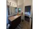 Bathroom vanity with granite countertops and access to the connected bedroom at 9535 Longwell Dr, Indianapolis, IN 46240