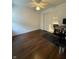 Empty bedroom featuring hardwood floors, a ceiling fan, and closet at 9535 Longwell Dr, Indianapolis, IN 46240