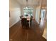 Dining area with ample light, neutral tones, and access to outdoor spaces at 9535 Longwell Dr, Indianapolis, IN 46240