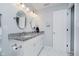 Bathroom featuring dual sinks with modern fixtures and plenty of cabinet storage at 9689 Wild Iris Dr, Noblesville, IN 46060