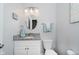 Well-lit bathroom with vanity, granite countertop, and neutral color scheme at 9689 Wild Iris Dr, Noblesville, IN 46060