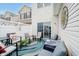 Comfortable fenced patio is decorated with outdoor furniture and a decorative sunburst accent at 9689 Wild Iris Dr, Noblesville, IN 46060