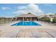 Stunning community pool is surrounded by plenty of lounge chairs and a clubhouse at 9689 Wild Iris Dr, Noblesville, IN 46060